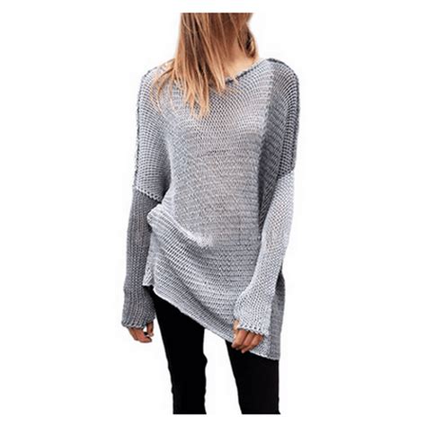 This simple and elegant hand knit sweater is worked sideways, with a unique detail along the sleeves, shoulders and neckline. . Sweaters with thumb holes